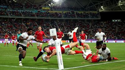 Wales' Josh Adams scores his sides third try during the 2019 Rugby World Cup Pool D match at Oita Stadium. PA Photo