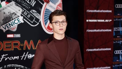 Tom Holland, in an oxblood Zenga suit and T-shirt, attends the 'Spider-Man: Far From Home' premiere at the TLC Chinese Theatre in Hollywood, California on June 26, 2019. EPA
