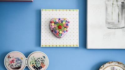 A wall hanging Akhtar made from buttons