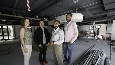 From left: Hebah Fisher, Habib Al-Assaad, Aman Merchant and Markos Desta at The Hub under construction at Dubai Downtown. Jaime Puebla / The National