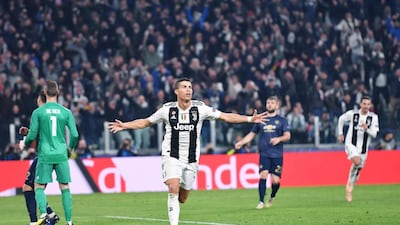 Juventus striker Cristiano Ronaldo wheels away in celebration after scoring. EPA