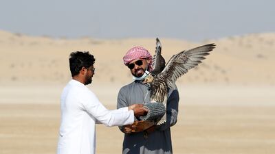 Falconry has been practised in the Arab region for 4,000 years, mainly by desert-dwelling Bedouins as an important form of hunting and fishing in a land with scarce natural resources. Pawan Singh / The National