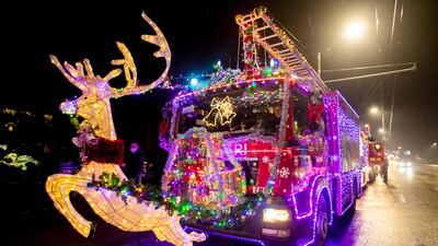 Fire trucks decorated with Christmas lights on a main street in Chisinau, Moldova. EPA