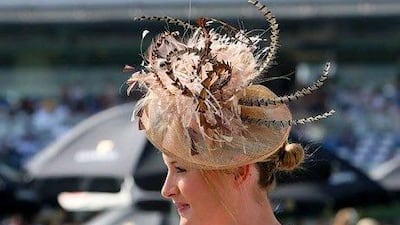 Extravagant hats are a norm at Dubai World Cup. Pawan Singh / The National