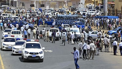 Sudanese rescue teams and security forces gather at the site of an assassination attempt against Sudan's Prime Minister Abdalla Hamdok, who survived the attack with explosives unharmed, in the capital Khartoum. AFP