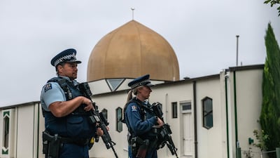 Armed police guard Al Noor mosque after it was officially reopened following last week's attack, on March 23, 2019. Getty Images
