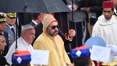 King Mohammed VI welcomes Pope Francis in Rabat. AFP