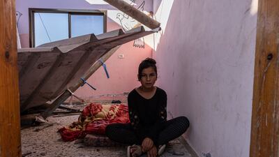 Taghrid Nassir's daughter Dunya, 13, sits in what used to be her bedroom.