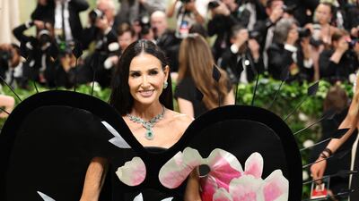 Demi Moore in Cartier jewellery and a Harris Reed gown. AFP