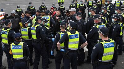 Police confront anti-vaccination and lockdown protesters in Melbourne, as the city enters the second day of a seven-day lockdown after a spike in community transmission of the Covid-19 coronavirus. AFP