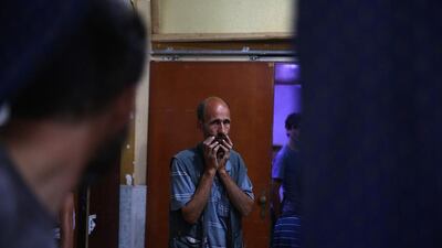 A man reacts as victims of a reported mortar attack are treated at a makeshift hospital in the rebel-held town of Douma, east of the capital Damascus, Syria. Abd Doumany / AFP