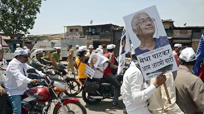 Supporters of the Aam Aadmi Party candidate Medha Patkar stage a two-wheeler rally in Mumbai on April 14. Punit Paranjpe / AFP