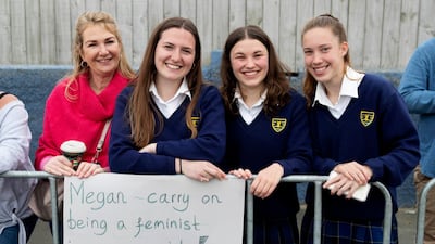 Members of the public wait to meet the royal pair at the Maranui Cafe. AP