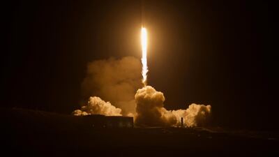 A SpaceX Falcon 9 rocket lifts off from the Vandenberg Air Force Base in California on December 22, 2017 with 10 satellites on board. However, the payload of a launch scheduled for January 5, 2018 has been kept top secret. Matt Hartman via AP