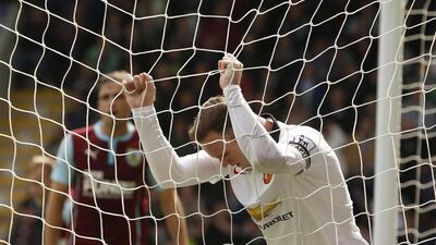 Manchester United's Wayne Rooney reacts after a missed opportunity in his side's 0-0 draw with Burnley on Saturday in the Premier League. Andrew Yates / Reuters