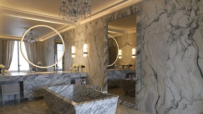 A bathroom in one of the suites is done up in white and black marble and has a two-tonne bathtub. Patrick Kovarik / AFP Photo