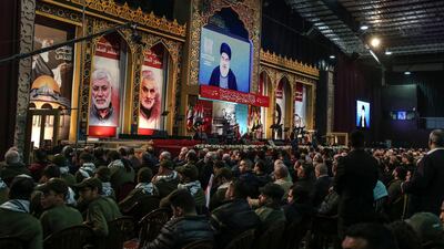 Hezbollah leader Hassan Nasrallah addresses supporters via a video link. EPA