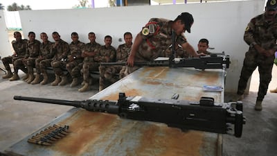 Members of the Counter-Terrorism Service at an arms-training session near Baghdad's international airport.