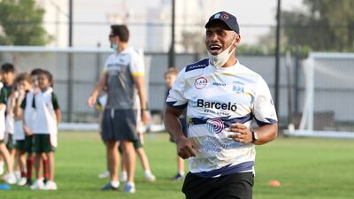Osea Kolinisau and his Speranza 22 teammates lead a training session for young rugby players in Dubai.