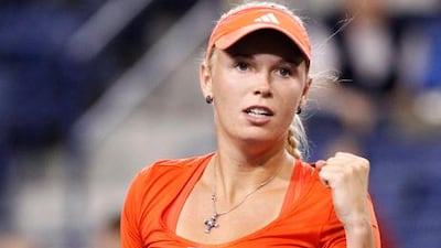 Caroline Wozniacki of Denmark celebrates her win over Sofia Arvidsson.