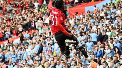 Manchester United midfielder Kobbie Mainoo celebrates after scoring his team's second goal. AFP