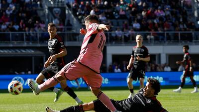 DC United defender Aaron Herrera attempts a slide tackle on Inter Miami full-back Jordi Alba. USA Today