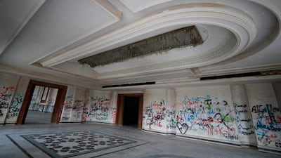 A picture shows one of former Iraqi dictator Saddam Hussein's palace in the Babylon Tourist Resort in the Babil Governorate in central Iraq on January 17, 2022. - Scattered across Iraq lie more than 100 opulent palaces and villas built by former dictator Saddam Hussein -- some in use, many in ruins like much of the war-scarred country. With their marble columns, ornate carvings and gaudy furniture, they reflected the delusions of grandeur and the megalomania of Saddam, who visited some of them only once or twice. (Photo by AHMAD AL-RUBAYE / AFP)