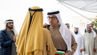 Sheikh Mohamed bin Rashid, Vice President and Ruler of Dubai, awards Sheikh Mansour bin Zayed, Deputy Prime Minister and Minister of the Presidential Court, with the Mohammed bin Rashid Sash