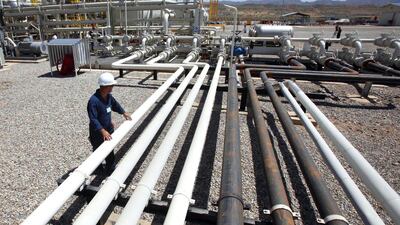 An employee works at Tawke oil fields in the semiautonomous Kurdish region in northern Iraq. One cargo of Kurdish crude was delivered in Houston in May to an unidentified buyer, and four other cargoes of Kurdish crude have been delivered this year in Israel. Hadi Mizban / AP Photo