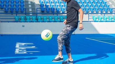 Omar Abdulrahman showcases his football skills with a giant tennis ball at the International Tennis Centre. Courtesy: Mubadala World Tennis Championship