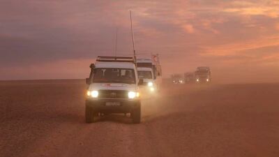 UN and SARC convoys delivering humanitarian assistance to displaced Syrians at Rukban camp near the Jordanian border. EPA / SARC