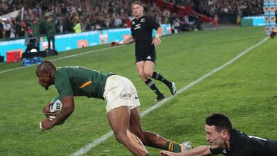 South Africa's Makazole Mampimpi scores his side's second try. EPA