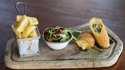 Crispy pancakes filled with leek, mushroom and cheese at The Scene restaurant in Pier 7 in Dubai Marina in Dubai. Pawan Singh / The National