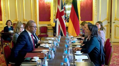 Britain's Foreign Secretary James Cleverly sits down for talks with German Foreign Minister Annalena Baerbock in London. PA