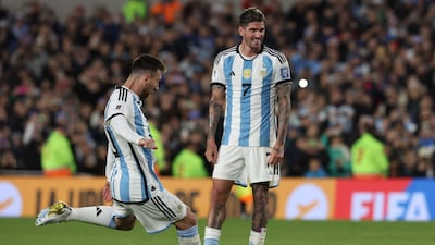 Argentina forward Lionel Messi shoots a free kick that hits the Paraguay post. AFP