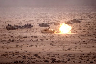 An M1 Abrams tank fires a round during an exercise in the Tan-Tan region of south-west Morocco. AFP