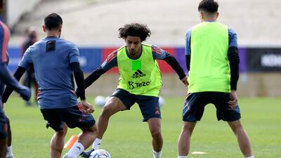 Manchester United player Zidane Iqbal dribbles the bal. AFP