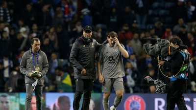 Jurgen Klopp, left, greeted Iker Casillas after Liverpool beat Porto in their Uefa Champions League quarter-final last month. Armando Franca / AP Photo