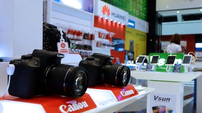 VAT will affect electronic items such as these digital cameras. Jeffrey E Biteng / The National