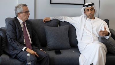 Khaled Al Marri, chief executive of real assets at Mubadala, right, and Dr Sadek Wahba of I Squared Capital. Antonie Robertson / The National