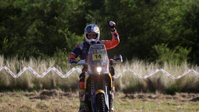 Sam Sunderland of Britain celebrates after finishing the special stage riding his KTM at Saturday's Dakar Rally from Rio Cuarto to Buenos Aires, Argentina. Ricardo Moraes / Reuters