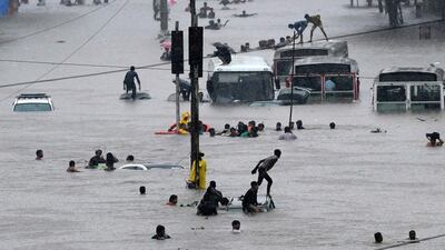Second prize for the 'Water' category shows the chaos of flooding in Mumbai in a photo by Shantha Kumar Samba Shivam Laila titled 'What a problem!'. Shantha Kumar Samba Shivam Laila