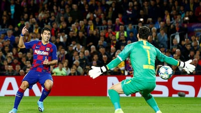 Barcelona's Luis Suarez scores the opening goal. EPA