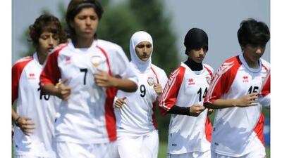 Members of the UAE women's national football team work out at a practice field in Pennsylvania during their visit to the United States. A letter-writer expresses enthusiasm for the team and the tour. Bradley C Bower / The National
