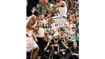 Boston's Paul Pierce soars to grab a rebound during Game 5 against the Lakers.