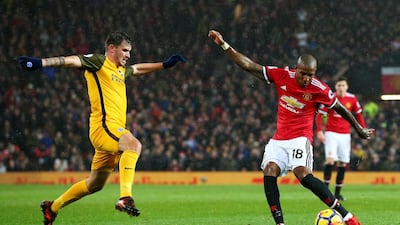 Ashley Young shoots to score Manchester United's decisive goal when his effort his deflected off Lewis Dunk. Alex Livesey / Getty Images