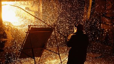 A worker operates a furnace. The Japanese firm Kobe Steel has admitted it provided inaccurate data to clients. Alexander Ermochenko/EPA