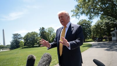 US President Donald Trump speaks to the press, ahead of departing for his trip to China. Reuters