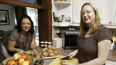 Keren Bobker, left, and Jennie Bishop are the founders of Well Preserved, a home-based business that specialises in sweet and savoury jams, jellies and chutneys. Jaime Puebla / The National