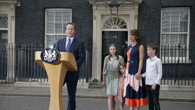 Britain’s outgoing Prime Minister, David Cameron, accompanied by his wife Samantha, daughters Nancy and Florence (C) and son Arthur, bids farewell outside Number 10 Downing Street on his last day in office on July 13, 2016. Peter Nicholls / Reuters